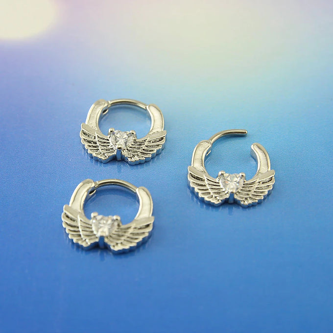 თეთრი კრისტალის ფრთა - პირსინგი